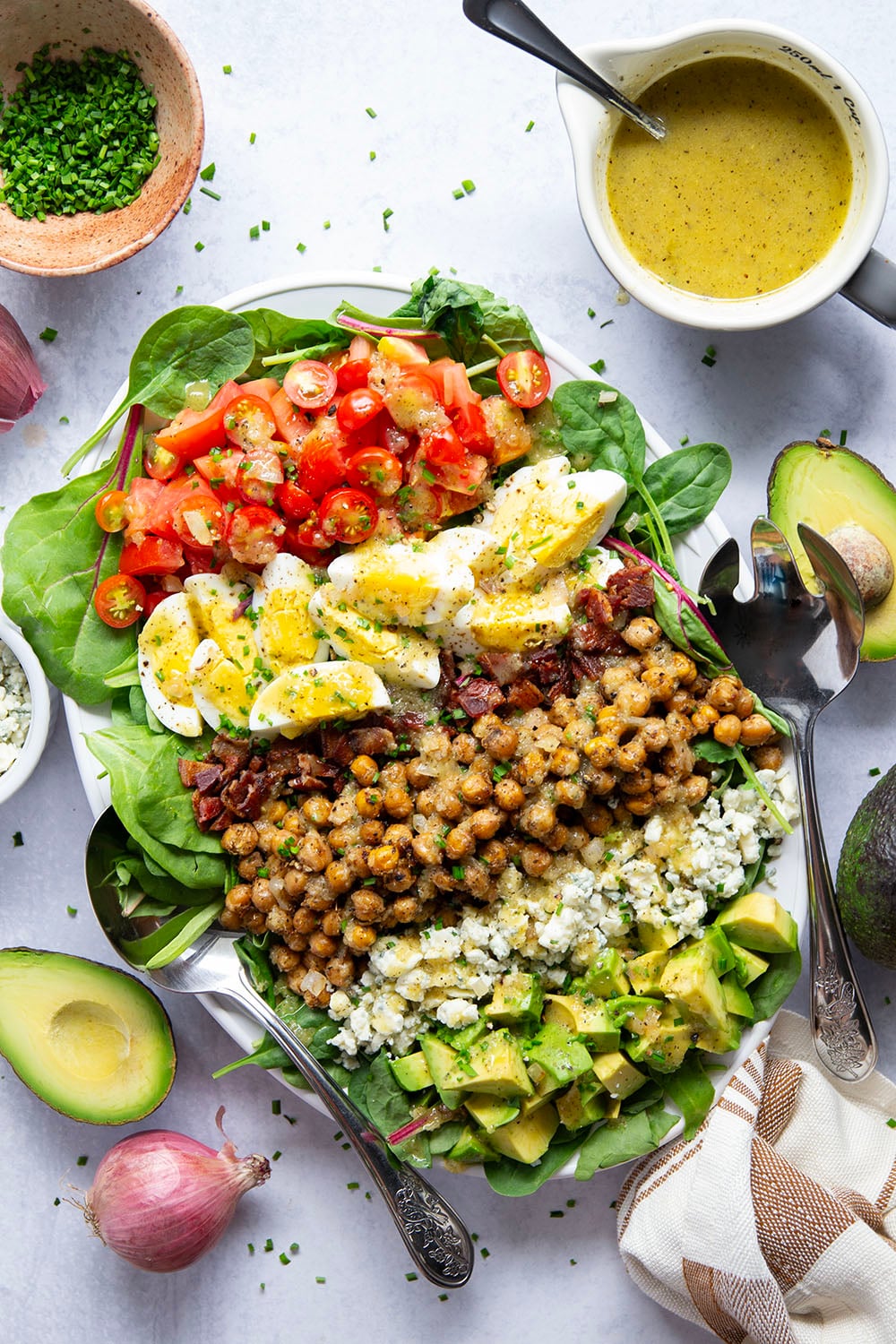 Crispy roasted chickpeas and a flavorful sautéed shallot dressing take this chickpea cobb salad to the next level!