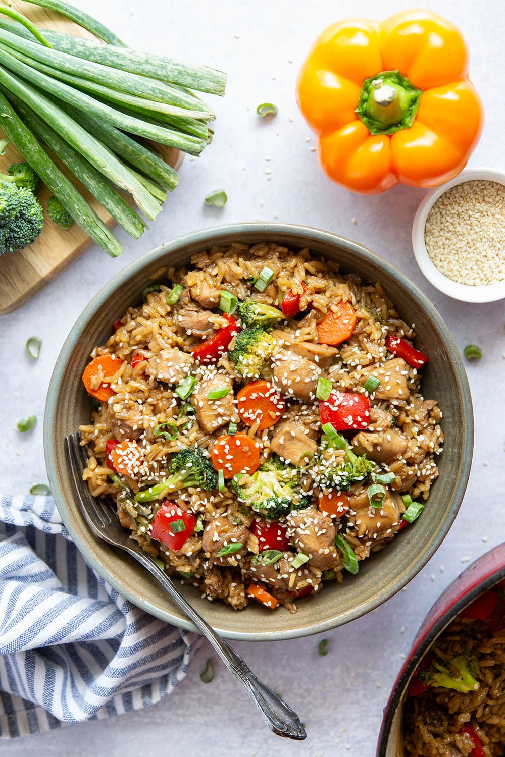 Cooked entirely in one pot and packed with saucy homemade teriyaki chicken and lots of veggies, this teriyaki chicken and rice is a weeknight savior!