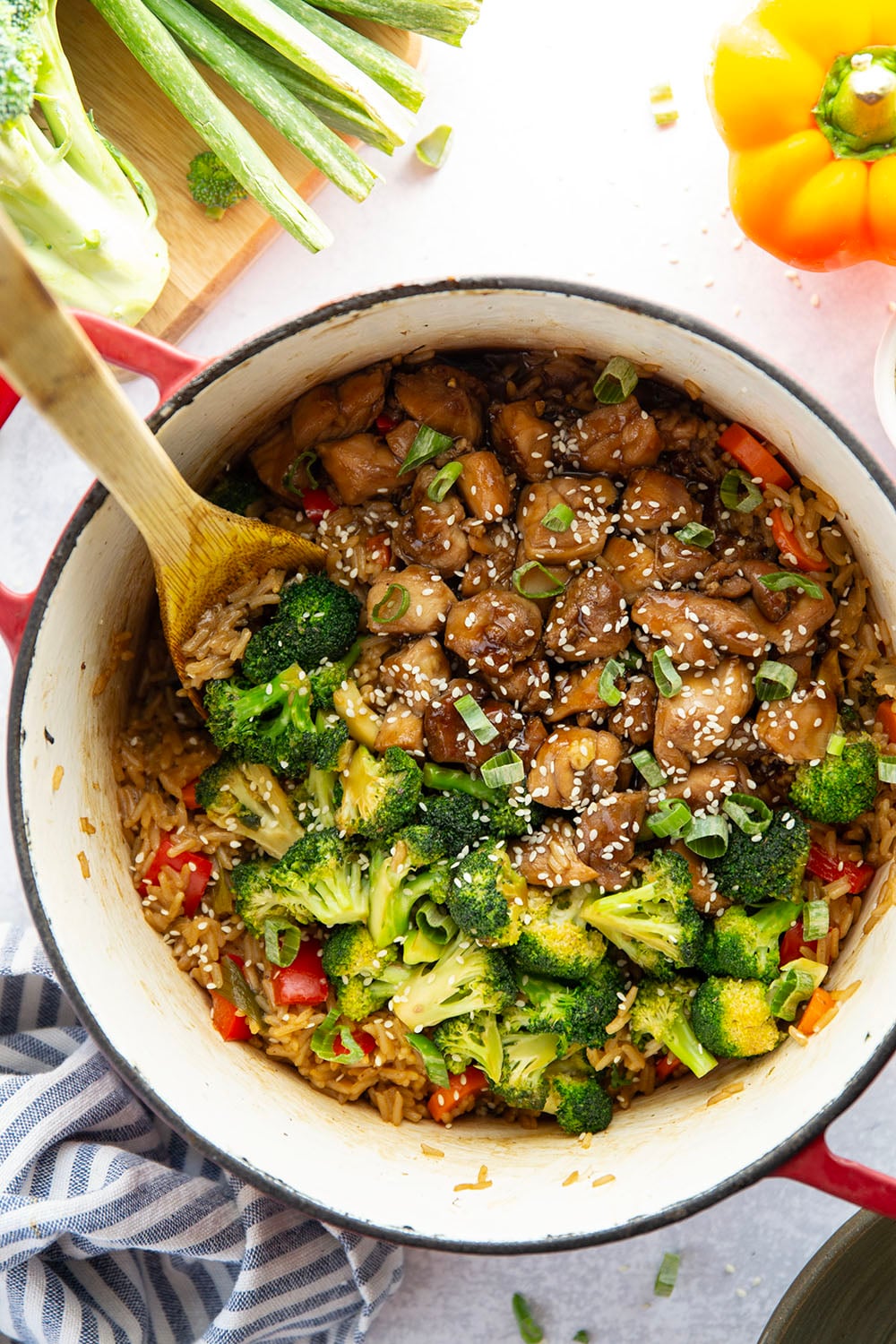 Cooked entirely in one pot and packed with saucy homemade teriyaki chicken and lots of veggies, this teriyaki chicken and rice is a weeknight savior!