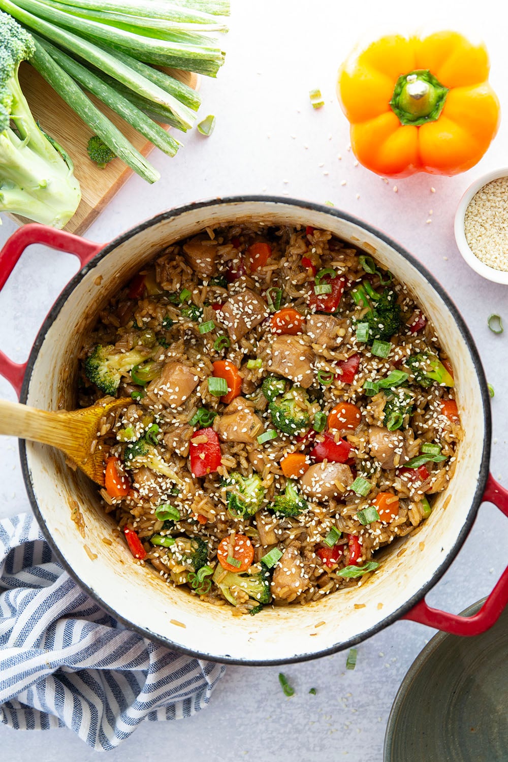 Cooked entirely in one pot and packed with saucy homemade teriyaki chicken and lots of veggies, this teriyaki chicken and rice is a weeknight savior!
