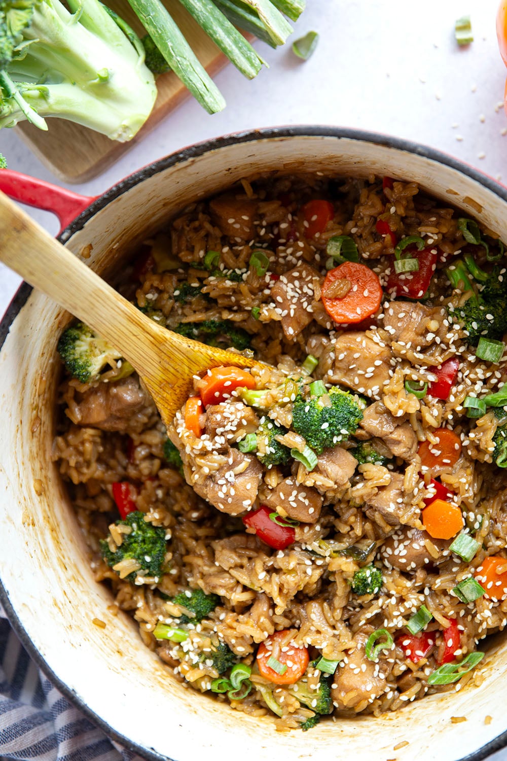 Cooked entirely in one pot and packed with saucy homemade teriyaki chicken and lots of veggies, this teriyaki chicken and rice is a weeknight savior!