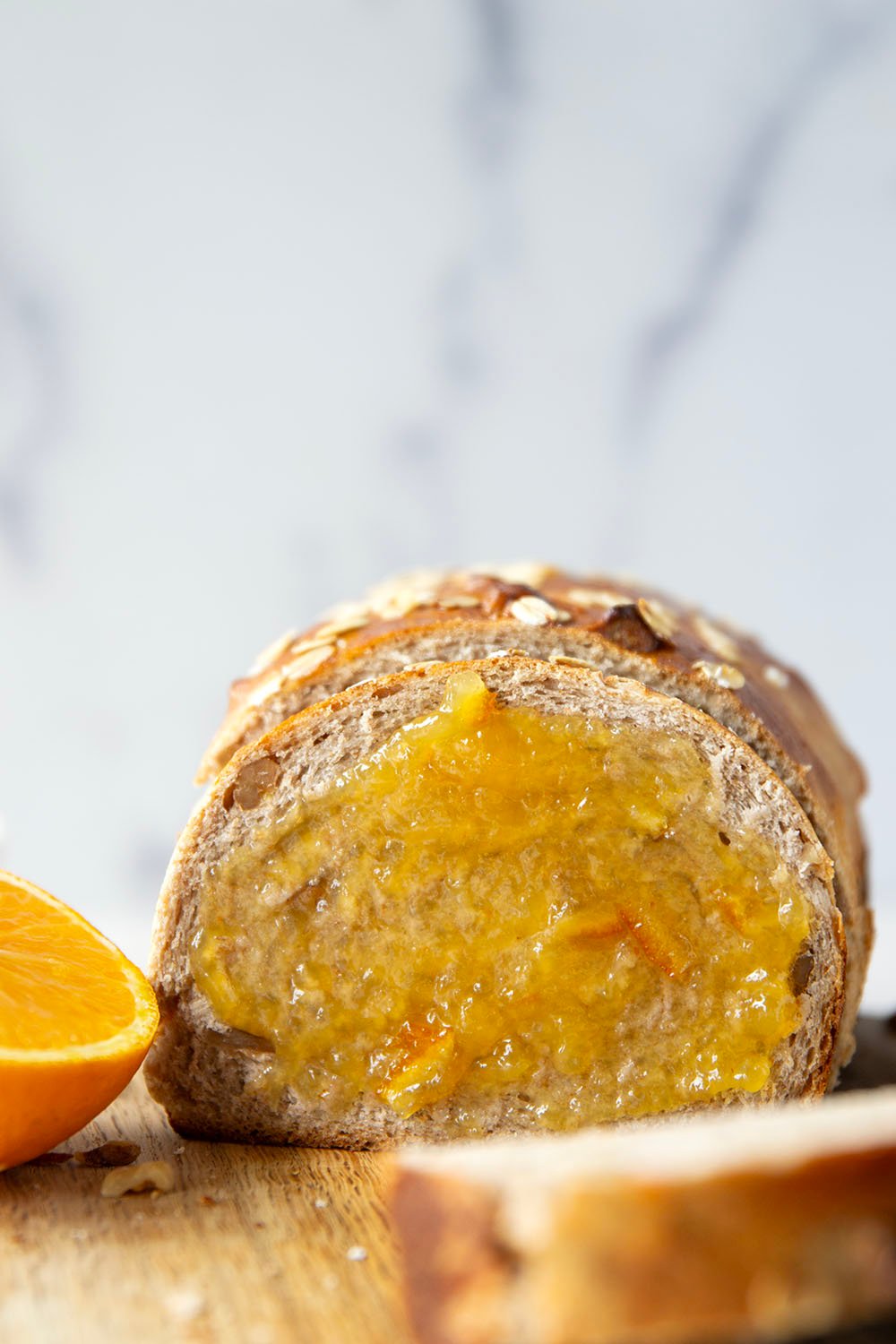 Perfectly soft, chewy and studded with crunchy walnuts and a touch of orange flavor, this yeast orange walnut bread is a loaf of pure sunshine!