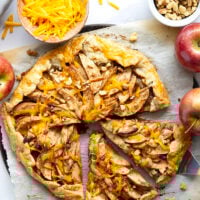 Baked with cheddar cheese in both the flaky crust and tender apple filling, this cheddar apple galette is a simple free-form pastry that's the perfect mix of sweet and savory!