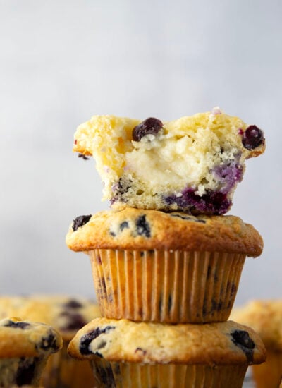 Super soft and moist blueberry cream cheese muffins with a rich cheesecake center and lots of juicy blueberries in every bite.