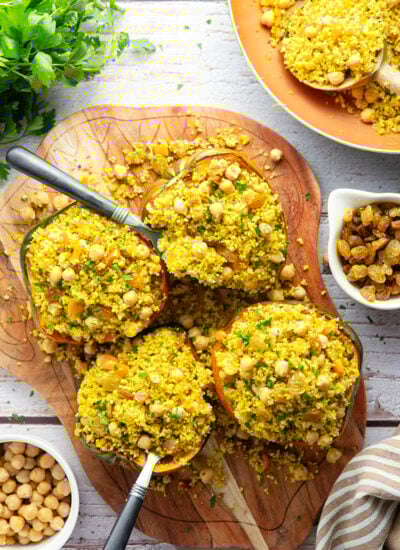 This couscous stuffed acorn squash features fluffy Moroccan-spiced golden couscous piled into tender acorn squash boats.