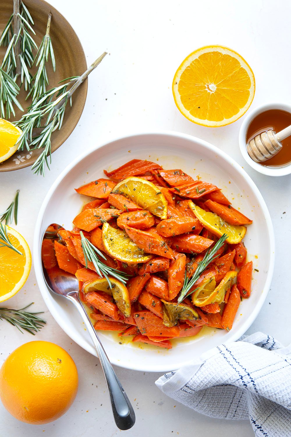 Glazed in a sweet and citrusy honey orange sauce and roasted until perfectly tender, these honey orange roasted carrots are an easy side dish that always pleases.