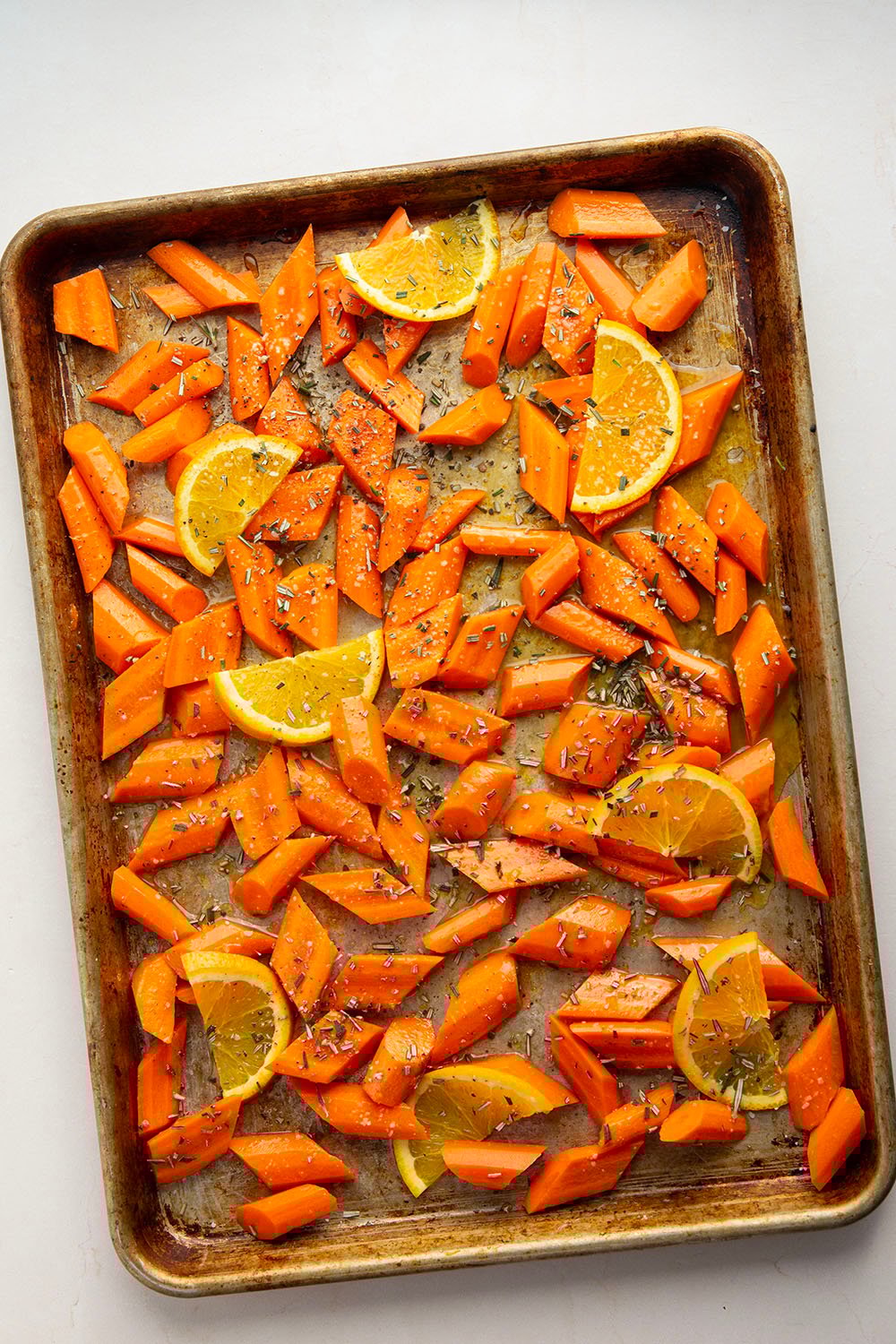 Glazed in a sweet and citrusy honey orange sauce and roasted until perfectly tender, these honey orange roasted carrots are an easy side dish that always pleases.