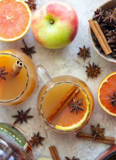 Simmered with chai spices and fresh citrus, this chai mulled apple cider has both a stovetop and slow cooker option and you can easily prep it ahead of time for holiday drinks.