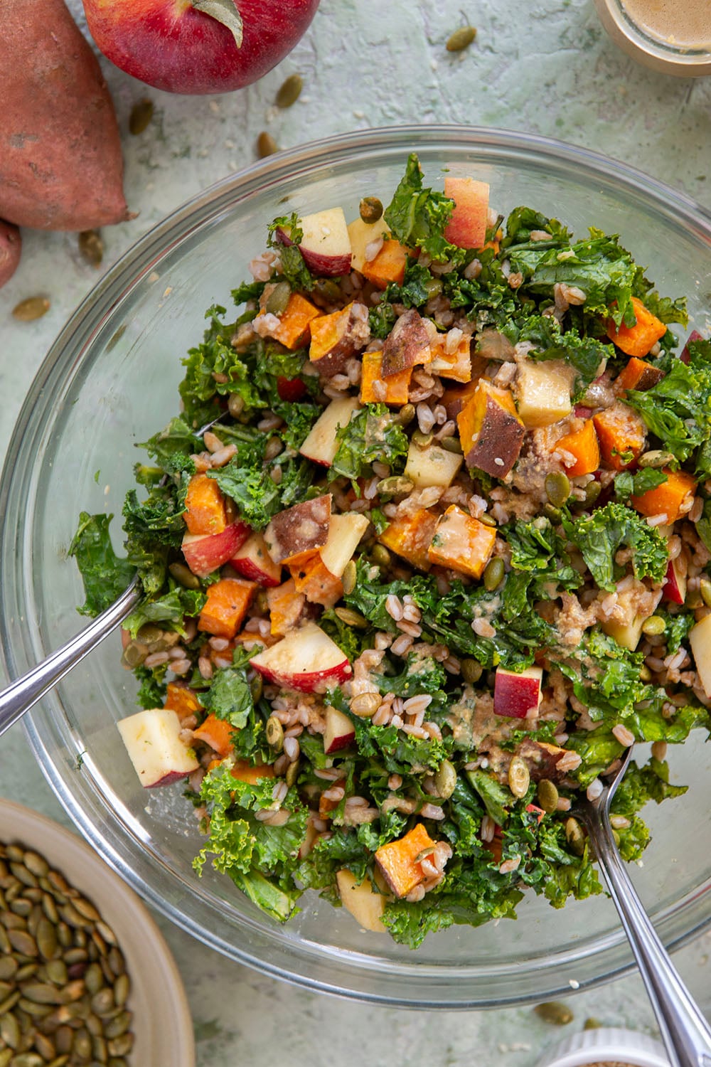 Tender roasted sweet potatoes and hearty farro add plenty of bulk to this fall-flavored sweet potato farro salad that gets dressed with a savory sesame dressing.