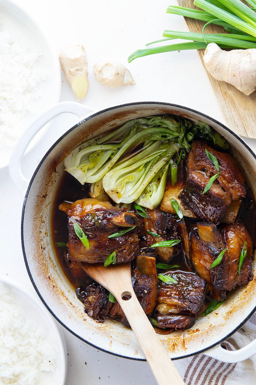 Slowly cooked in a flavorful ginger soy broth until fall-apart tender, these soy braised short ribs are easy to put together for a holiday dinner and excellent served over steamed rice with baby bok choy.