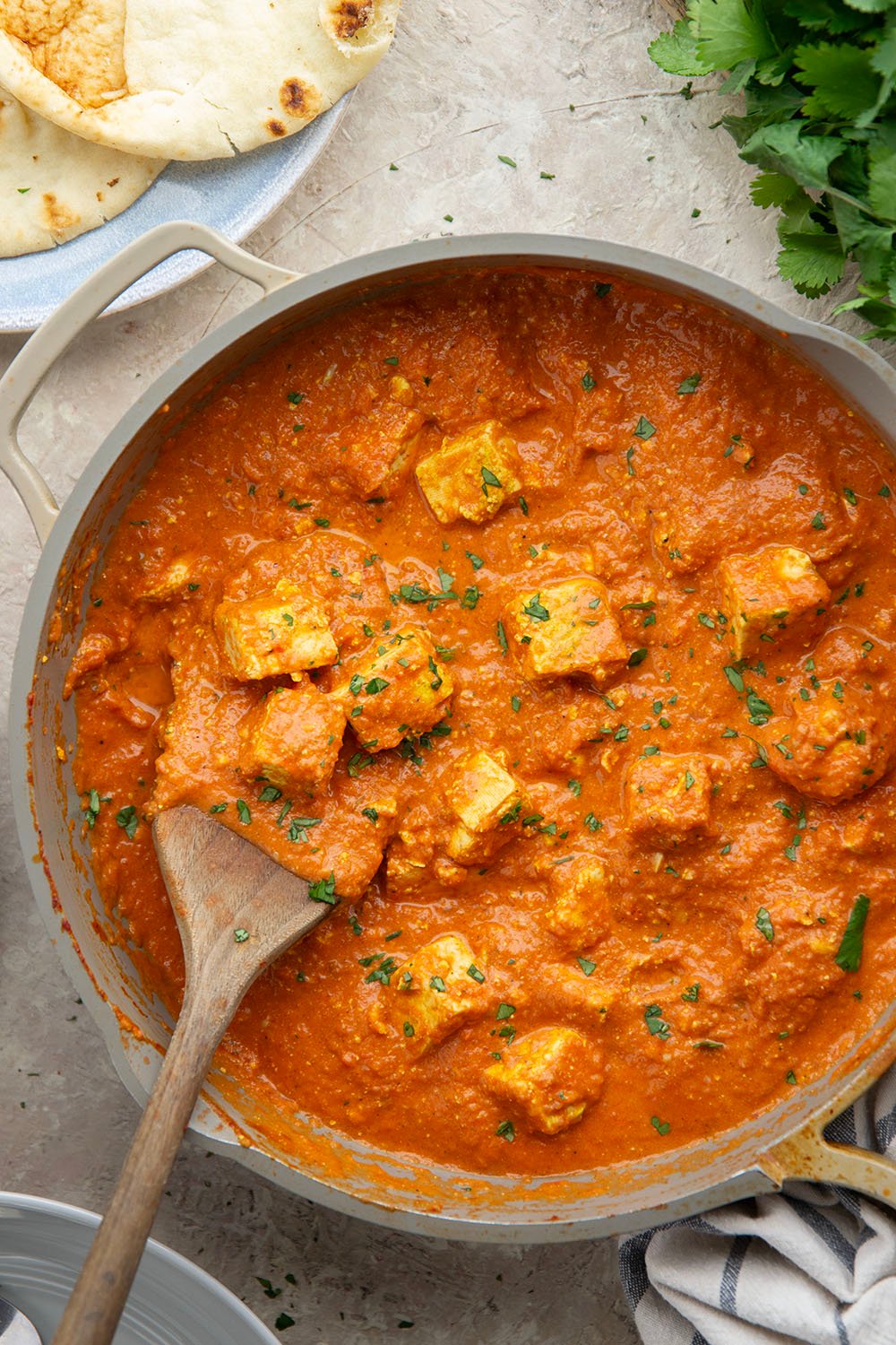 Rich and creamy tofu tikka masala features a flavorful scratch-made tikka masala sauce simmered with yogurt-marinated tofu cubes. This vegetarian take on tikka masala is just as satisfying as the chicken version!