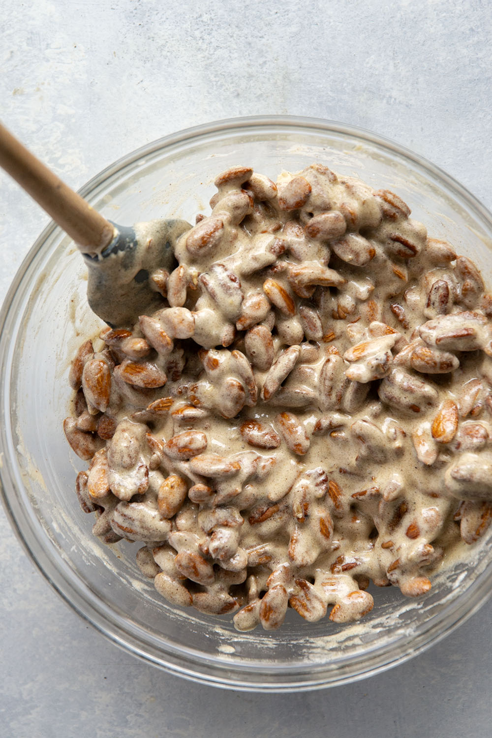 Roasted to perfection in maple syrup and spices, these maple candied pecans and almonds make the ultimate holiday snack or gift!