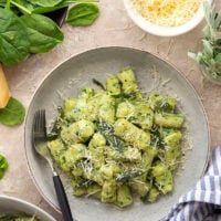 Light and fluffy homemade spinach gnocchi is packed with vibrant fresh spinach and tossed in a sage browned butter and lots of fresh Parmesan.