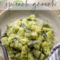 Light and fluffy homemade spinach gnocchi is packed with vibrant fresh spinach and tossed in a sage browned butter and lots of fresh Parmesan.