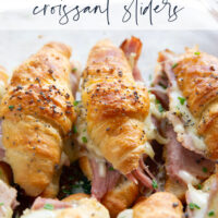 Gooey gruyere cheese, sliced deli ham, and a chive honey mustard spruce up classic ham and cheese croissant sliders into a winning appetizer that will disappear within minutes every time!