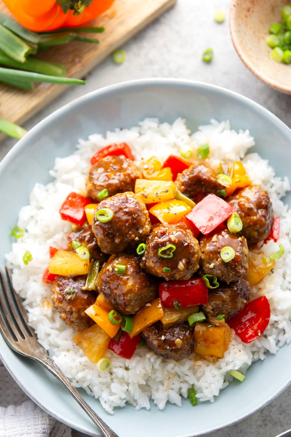 A homemade sweet and sour sauce coats every inch of these juicy sweet and sour meatballs that cook up with colorful peppers and sweet pineapple all in one pan.