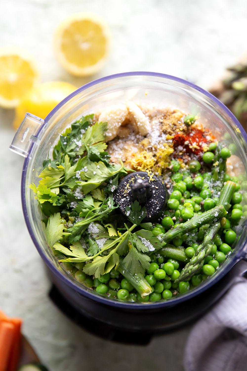Vibrant spring peas and asparagus are the best spring twist on hummus! This asparagus pea hummus is silky smooth and pairs wonderfully with fresh vegetables and pita chips for dipping.