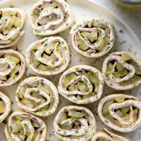 Stuffed with tender ham slices, sliced dill pickle spears, and a spicy jalapeno cream cheese, these dill pickle pinwheels are a quick appetizer that everyone always loves!