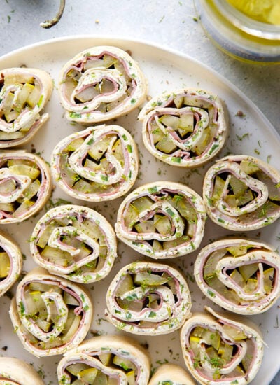 Stuffed with tender ham slices, sliced dill pickle spears, and a spicy jalapeno cream cheese, these dill pickle pinwheels are a quick appetizer that everyone always loves!
