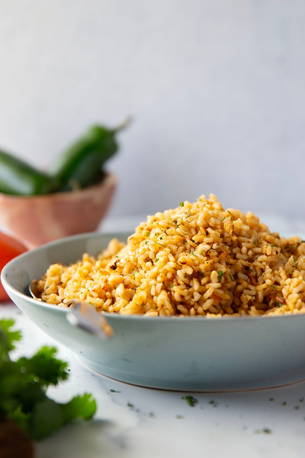 Made entirely in the instant pot in minutes and a close replica of restaurant-style Mexican rice, this instant pot Mexican rice is perfectly fluffy and packed with flavor!