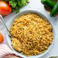 Made entirely in the instant pot in minutes and a close replica of restaurant-style Mexican rice, this instant pot Mexican rice is perfectly fluffy and packed with flavor!