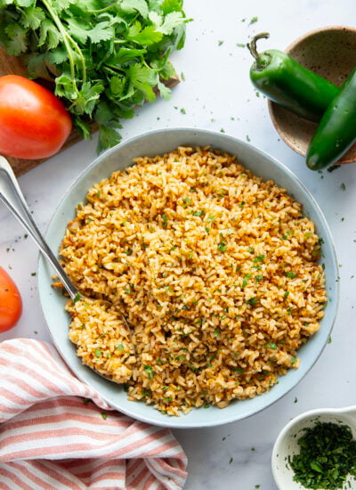 Made entirely in the instant pot in minutes and a close replica of restaurant-style Mexican rice, this instant pot Mexican rice is perfectly fluffy and packed with flavor!