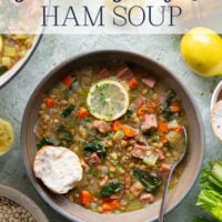 Tender lentils and lots of fresh lemon jazz up this hearty lentil ham soup that comes together all in one pot and is the best use for leftover ham!