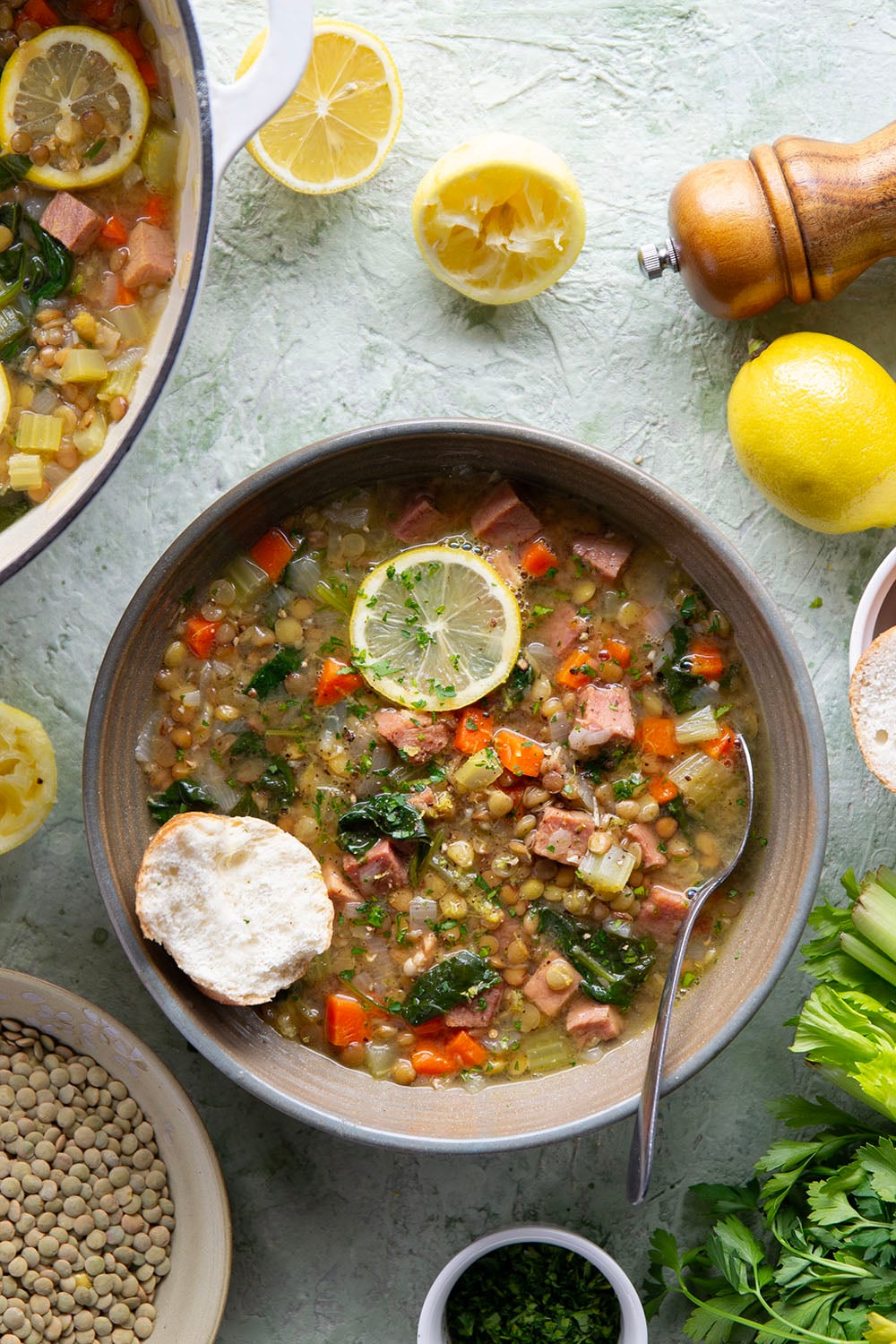 Tender lentils and lots of fresh lemon jazz up this hearty lentil ham soup that comes together all in one pot and is the best use for leftover ham!