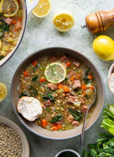 Tender lentils and lots of fresh lemon jazz up this hearty lentil ham soup that comes together all in one pot and is the best use for leftover ham!