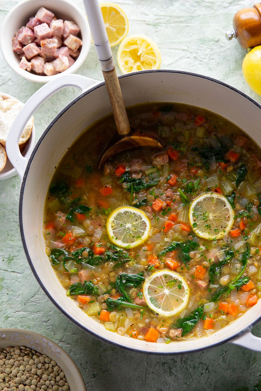 Tender lentils and lots of fresh lemon jazz up this hearty lentil ham soup that comes together all in one pot and is the best use for leftover ham!
