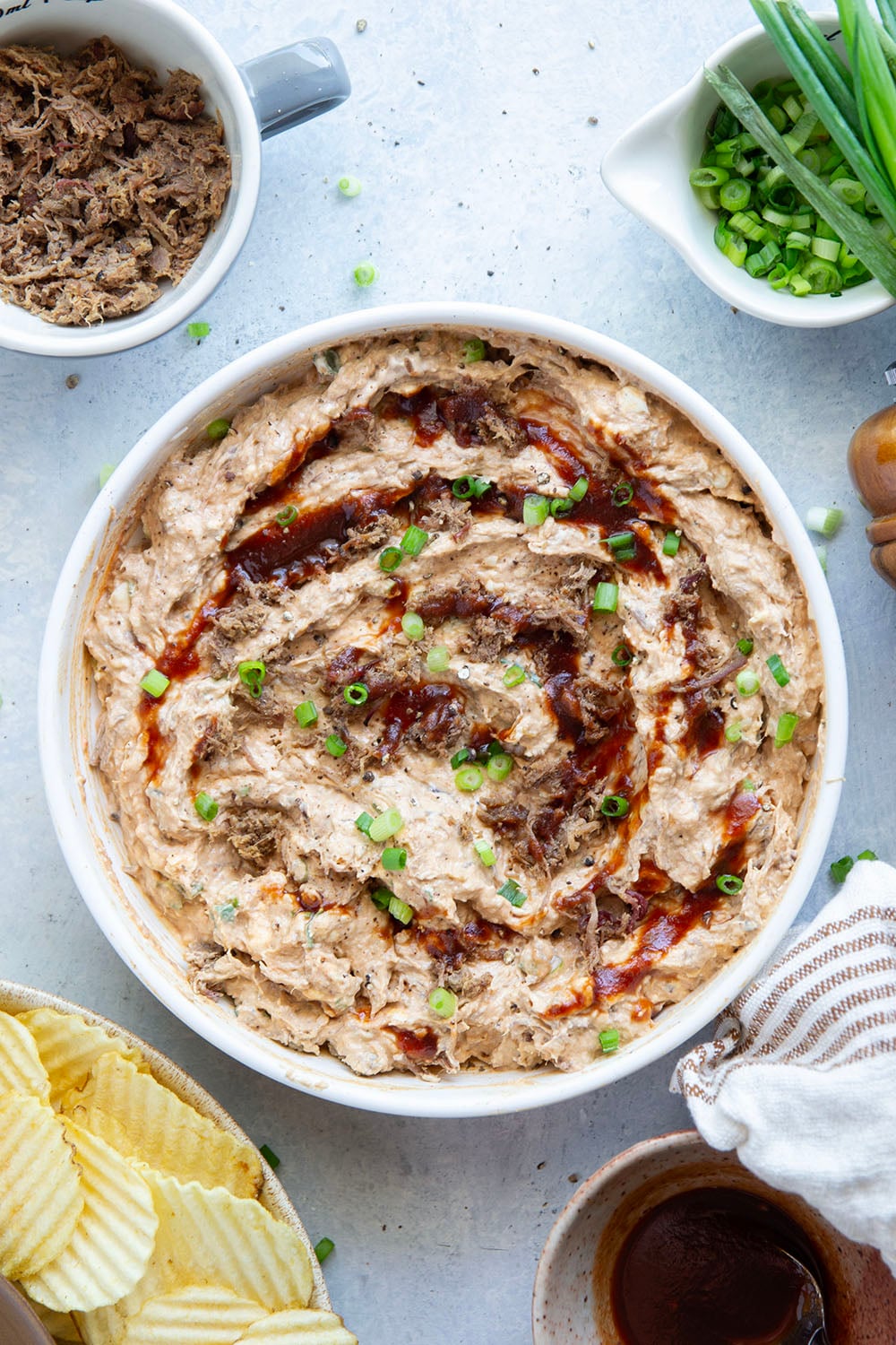 Leftover brisket is the perfect meaty base for this creamy, flavorful BBQ beef brisket dip that goes great with chips, crackers, or as sandwich spread!