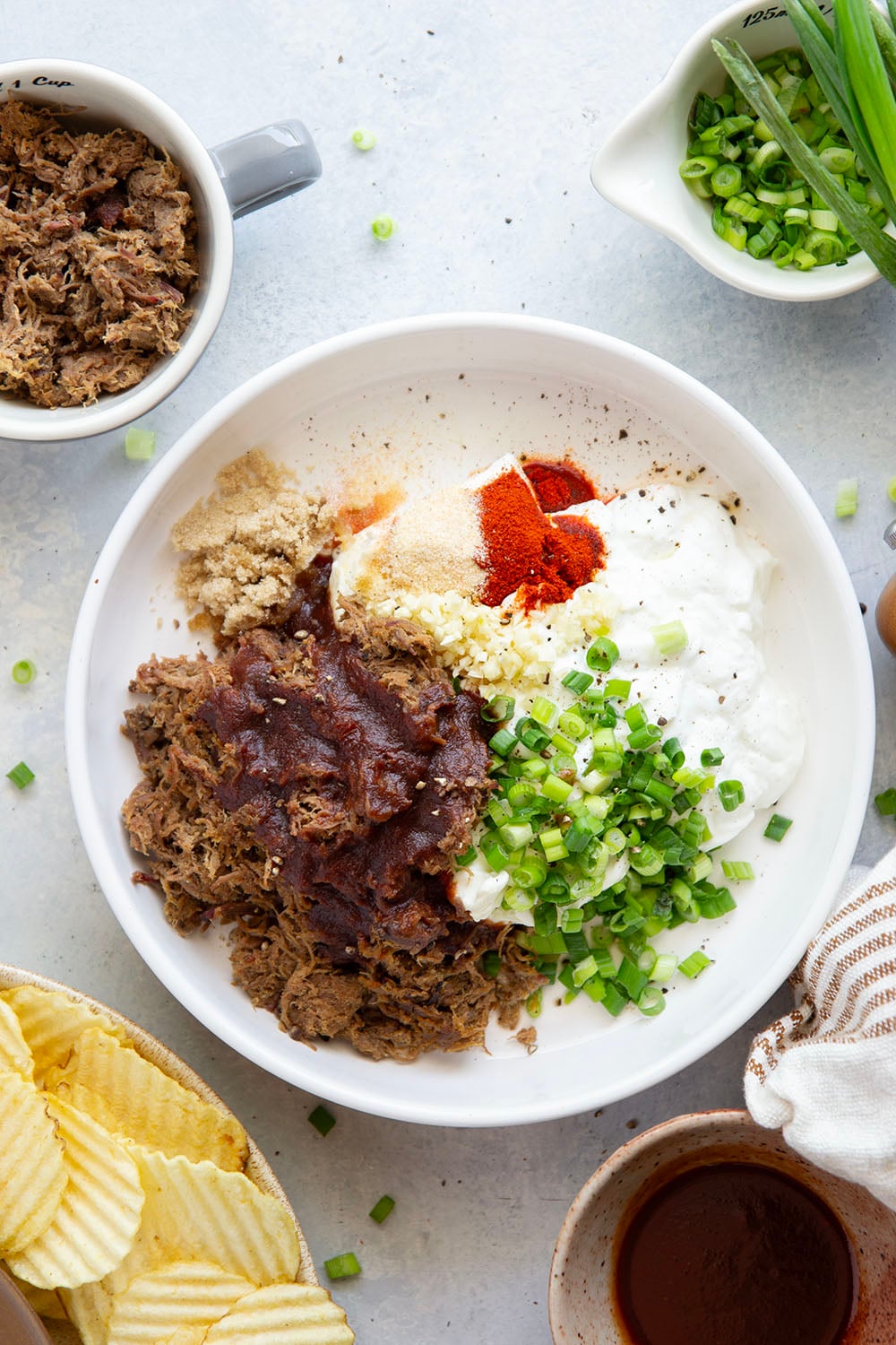 Leftover brisket is the perfect meaty base for this creamy, flavorful BBQ beef brisket dip that goes great with chips, crackers, or as sandwich spread!