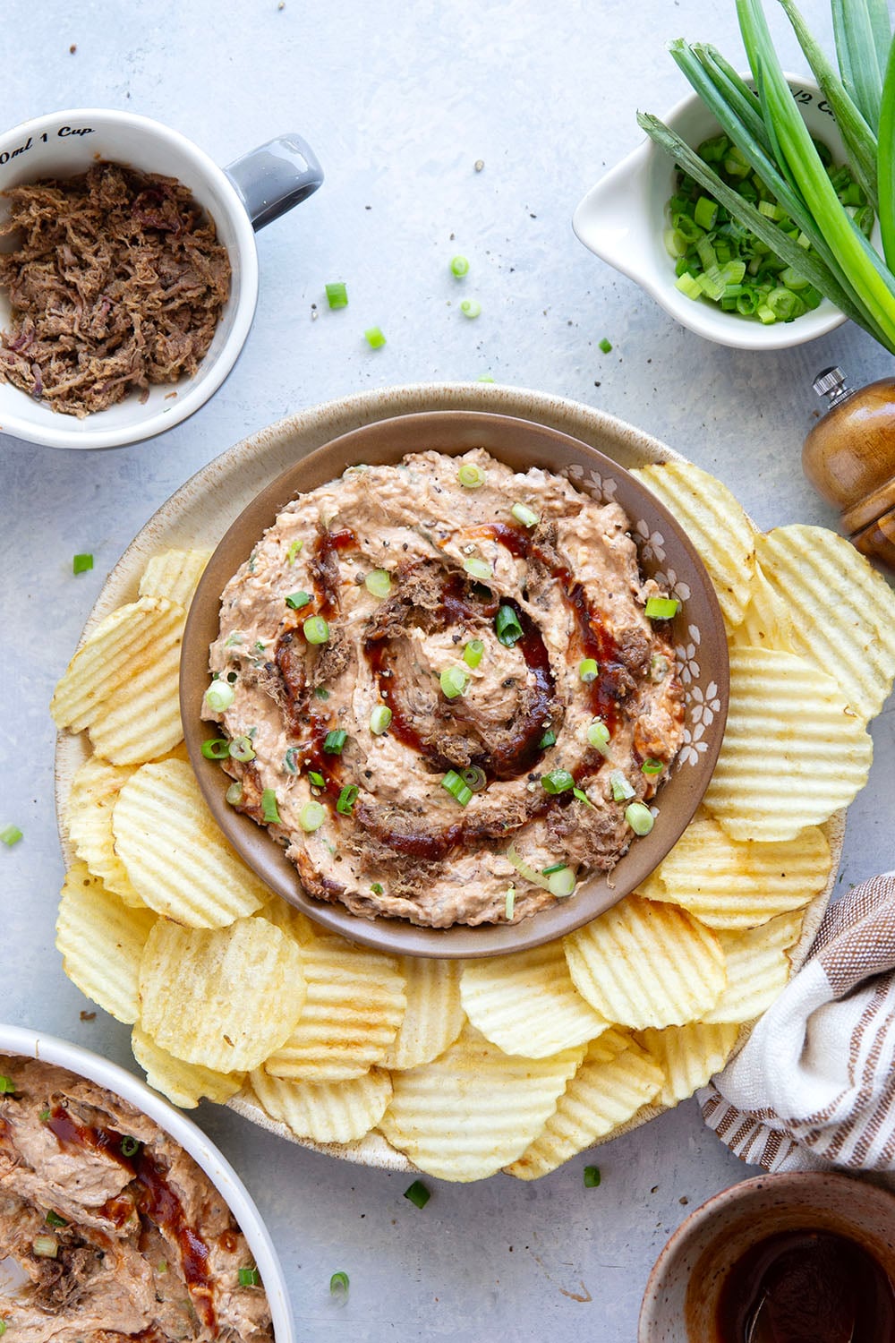 Leftover brisket is the perfect meaty base for this creamy, flavorful BBQ beef brisket dip that goes great with chips, crackers, or as sandwich spread!