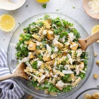 Packed with tender chopped kale, pasta, and all the caesar salad works including a homemade lemon caesar dressing, this kale caesar pasta salad will soon be a cookout staple for the summer.