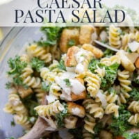 Packed with tender chopped kale, pasta, and all the caesar salad works including a homemade lemon caesar dressing, this kale caesar pasta salad will soon be a cookout staple for the summer.