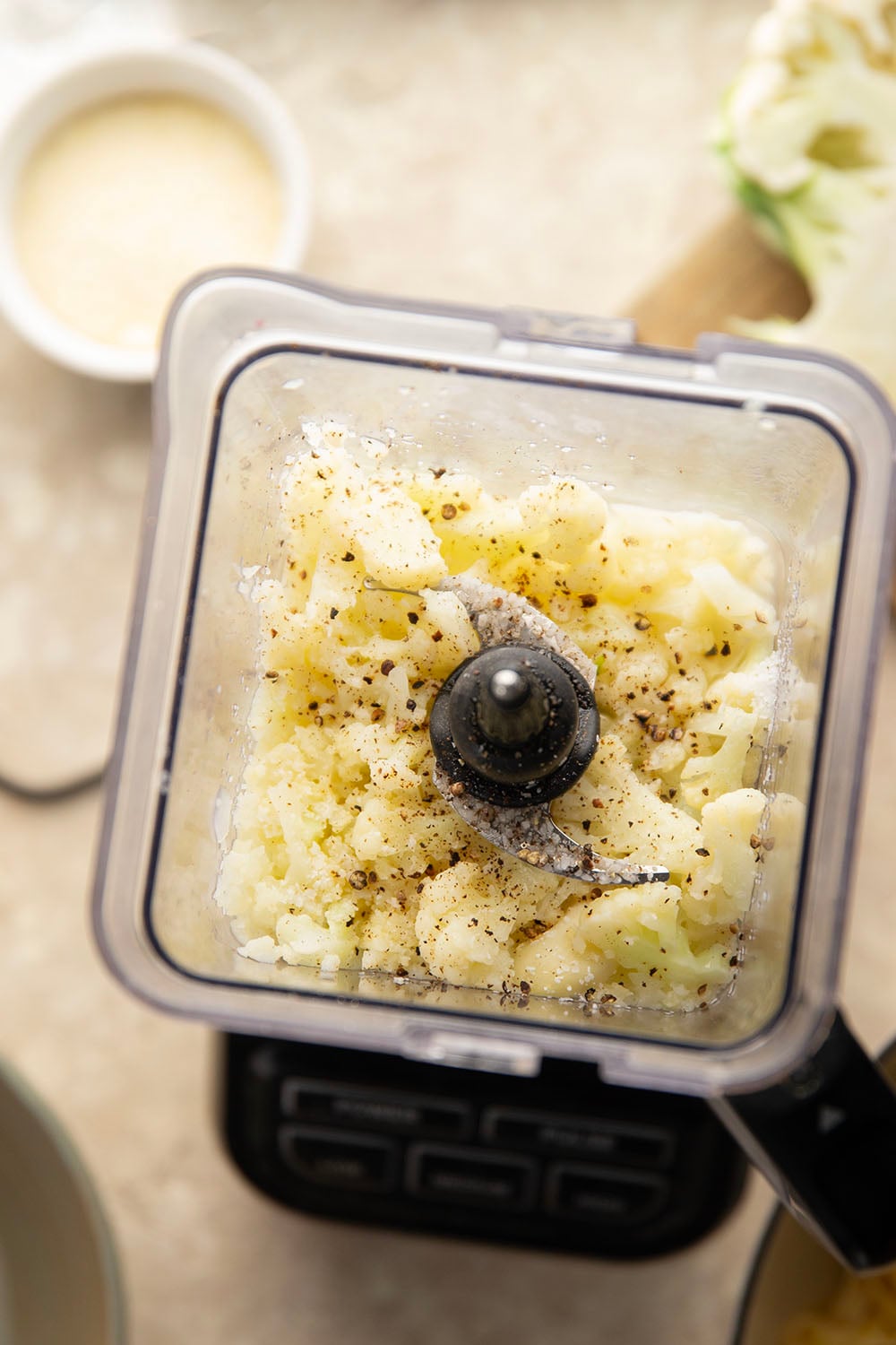 Indulge in a creamy, silky alfredo sauce for a fraction of the calories in this cauliflower alfredo sauce version! NO heavy cream needed and it's made in minutes on the stovetop.