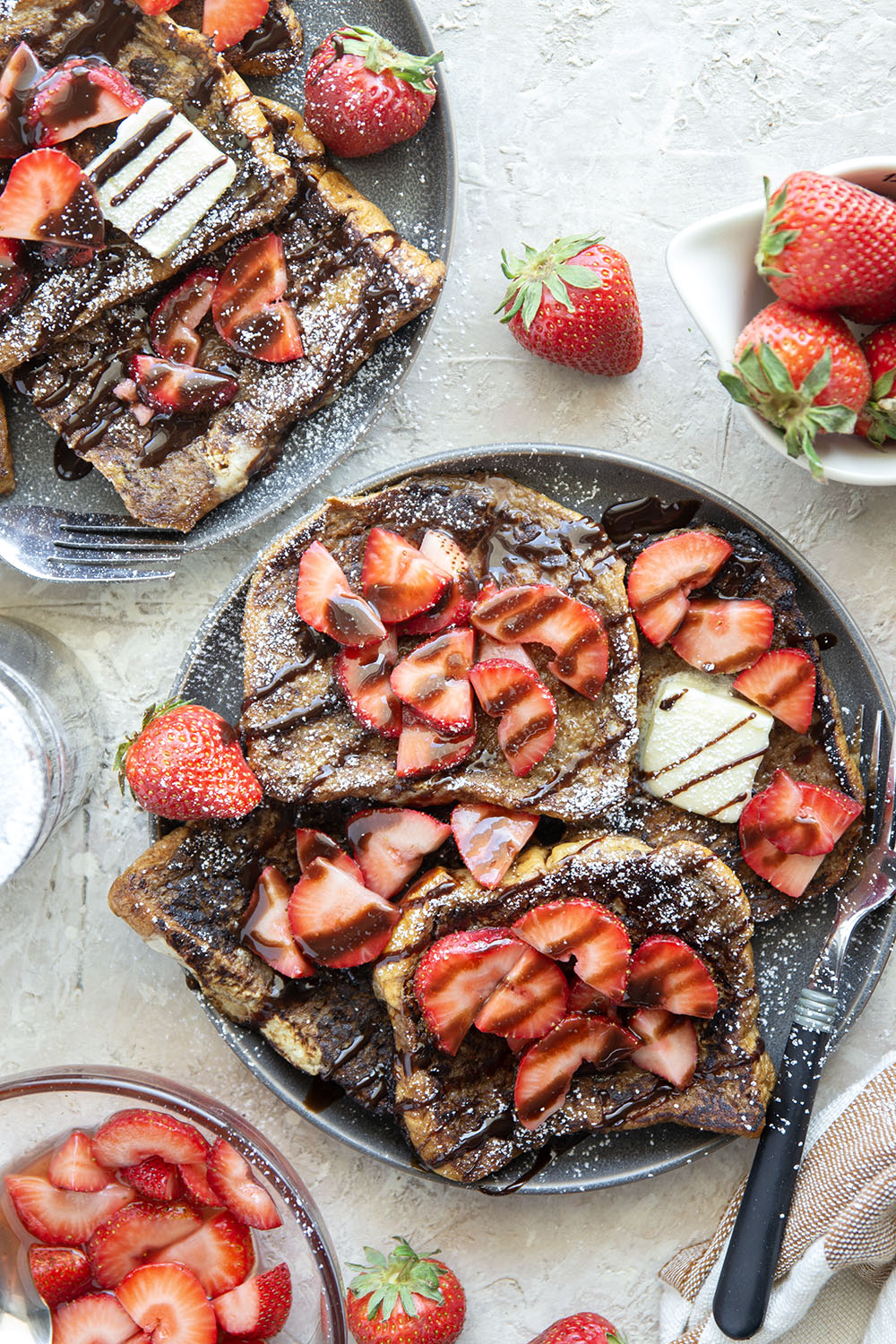 This stunning espresso chocolate French toast is a mocha-lover's dream! Serve slices hot off the griddle with fresh strawberry sauce and plenty of chocolate syrup.