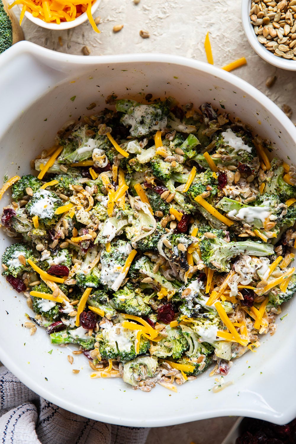 A quick smoky char on broccoli and plenty of freshly shredded cheddar transform this creamy broccoli cheddar salad into a side dish that's always the first to disappear!