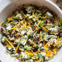 A quick smoky char on broccoli and plenty of freshly shredded cheddar transform this creamy broccoli cheddar salad into a side dish that's always the first to disappear!