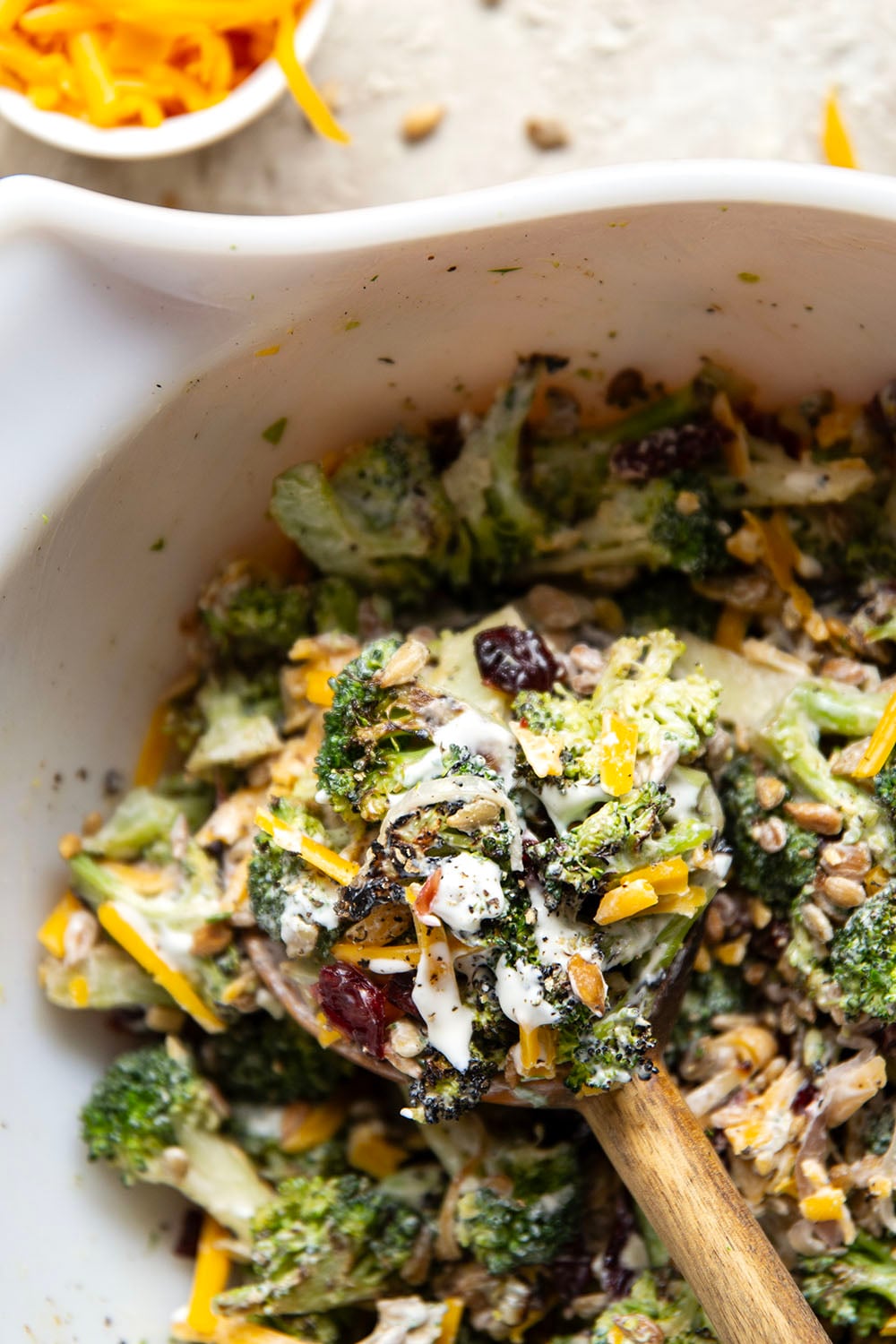 A quick smoky char on broccoli and plenty of freshly shredded cheddar transform this creamy broccoli cheddar salad into a side dish that's always the first to disappear!