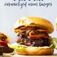 This juicy caramelized onion burger features caramelized onions and sweet peppers packed both inside the burger for extra flavor and more piled on top with a slice of pepperjack cheese and crisp lettuce.