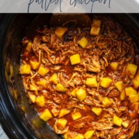 Slow cooked until perfectly fall-apart tender in lots of sweet mango and a homemade sauce, this pulled mango BBQ chicken makes the best summer sandwich with fresh slaw on top.