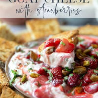 Silky whipped goat cheese is topped with juicy honey roasted strawberries and incredible served with crostini for dipping.