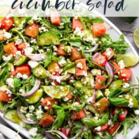 Sweet watermelon, tangy feta, and crisp cucumbers are the best salad combo in this watermelon feta cucumber salad that gets dressed in a fresh basil lime dressing and goes well with any summer meal.