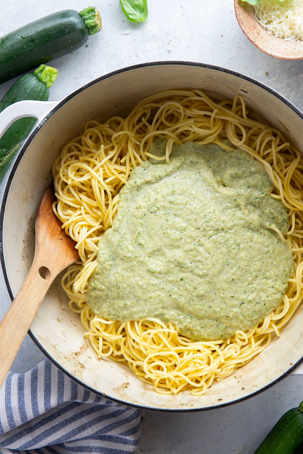 Sauteed zucchini gets blended down into a super creamy and velvety sauce along with lots of fresh basil and Parmesan cheese in this creamy zucchini pasta.