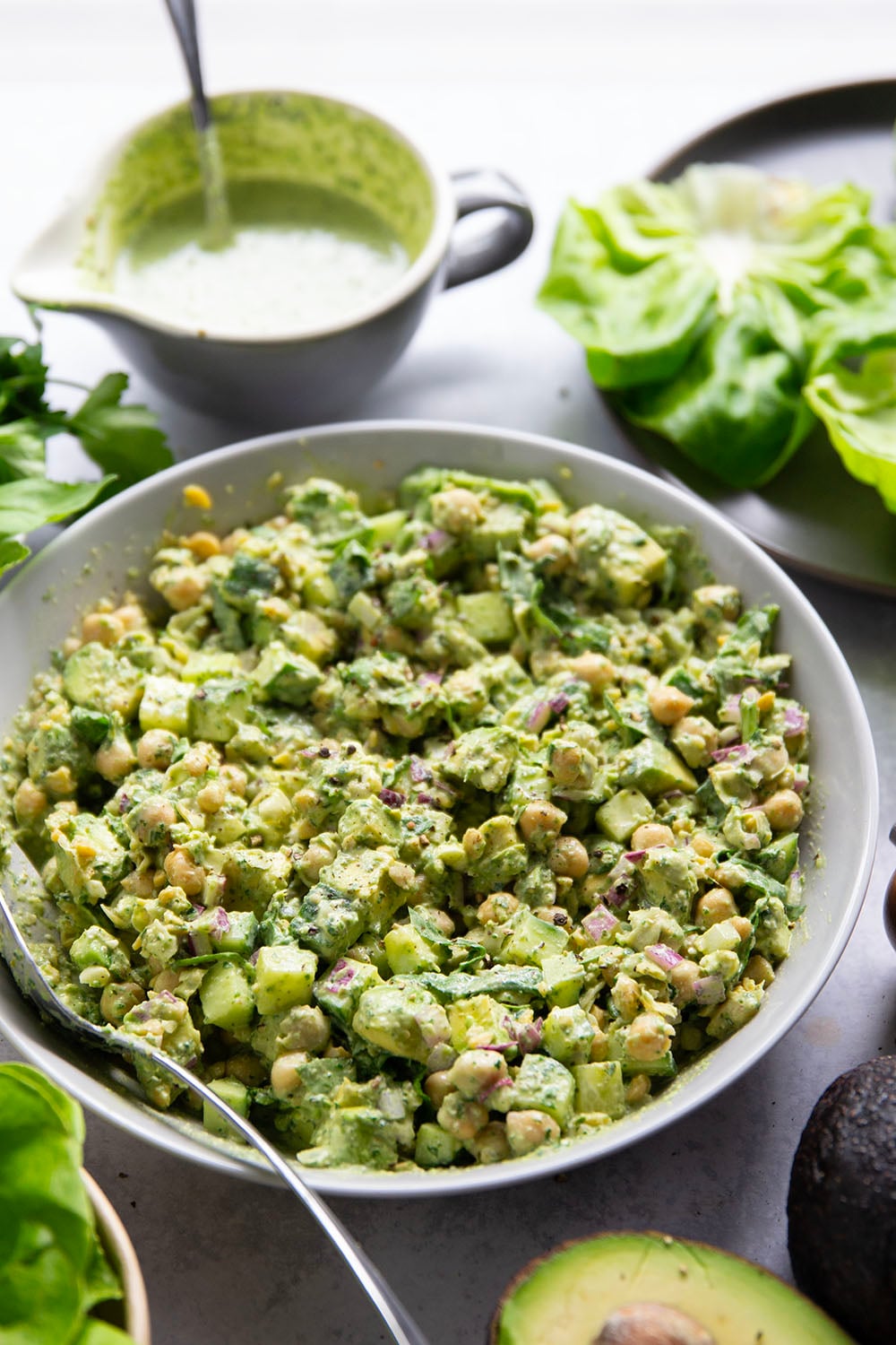 Smashed chickpeas, crunchy cucumber, and an herby green goddess sauce pack tons of flavor into these light, yet filling chickpea lettuce wraps.