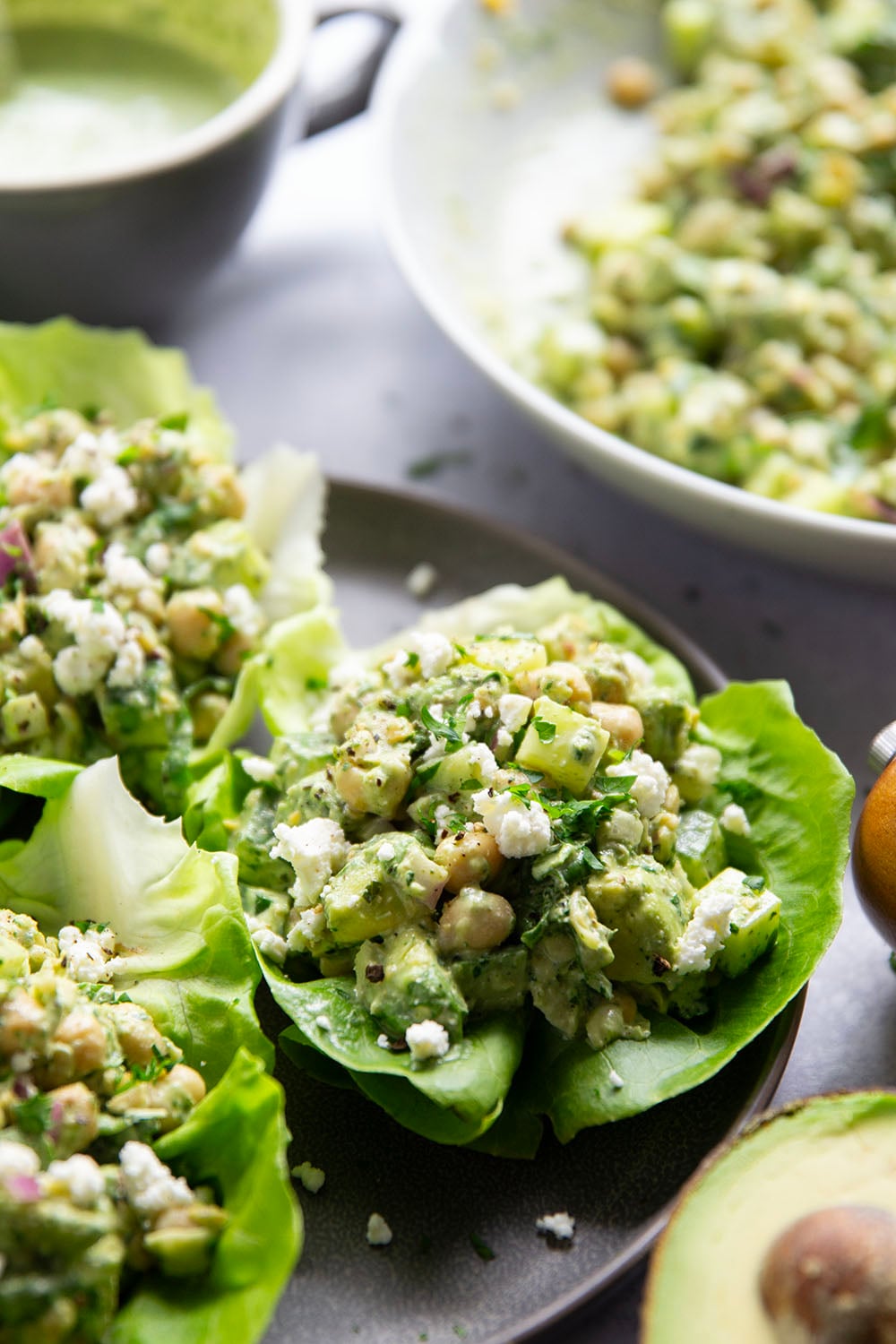 Smashed chickpeas, crunchy cucumber, and an herby green goddess sauce pack tons of flavor into these light, yet filling chickpea lettuce wraps.
