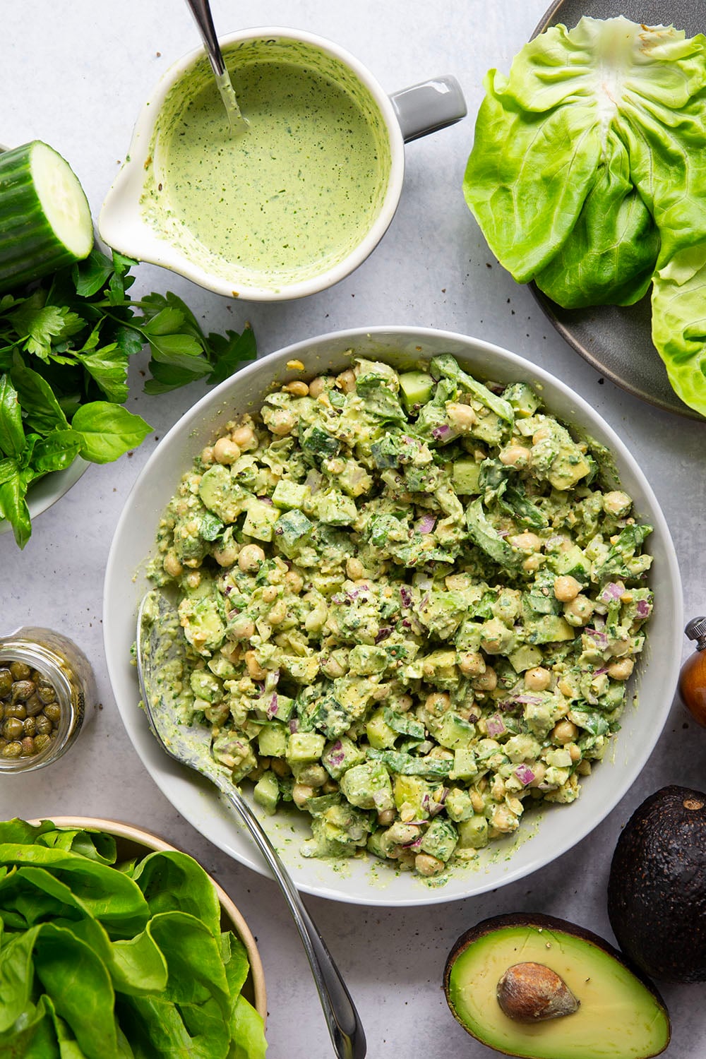 Smashed chickpeas, crunchy cucumber, and an herby green goddess sauce pack tons of flavor into these light, yet filling chickpea lettuce wraps.