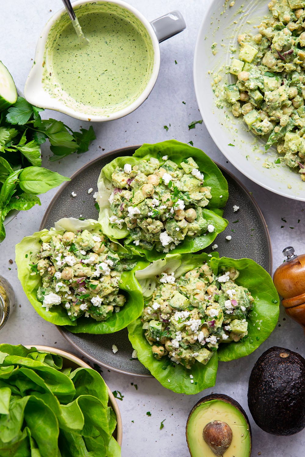 Smashed chickpeas, crunchy cucumber, and an herby green goddess sauce pack tons of flavor into these light, yet filling chickpea lettuce wraps.