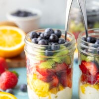 Take your fruit salad along to those summer picnics the easy way! Layer it up rainbow-style in a jar with a creamy citrus yogurt dressing. This layered fruit salad will quickly become a summer favorite.